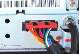 connects to 9-pin port on radio